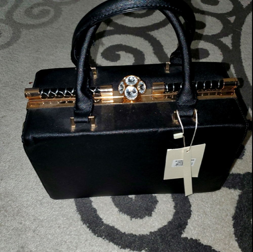 Nwt never worn hand bag  w/ crystal imbelishment